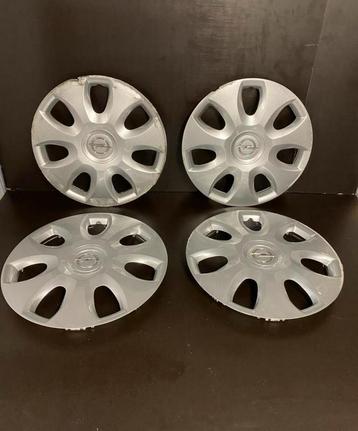 4 originele Opel corsa combo Astra 15" wieldoppen beschikbaar voor biedingen