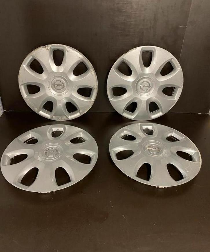 4 originele Opel corsa combo Astra 15" wieldoppen, Auto diversen, Wieldoppen, Gebruikt, Ophalen of Verzenden