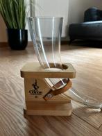 La corne + kwak, Ophalen