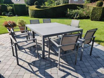 Tuinset - 2 grijze metalen glazen tafels + 7 stoelen