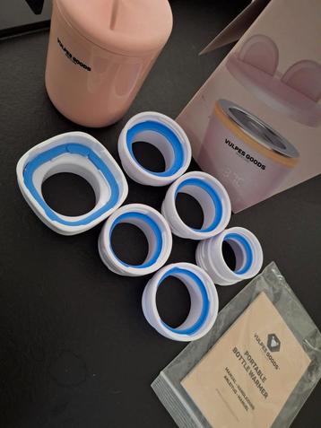 Draagbare flessenwarmer met 6 opzetstukken beschikbaar voor biedingen
