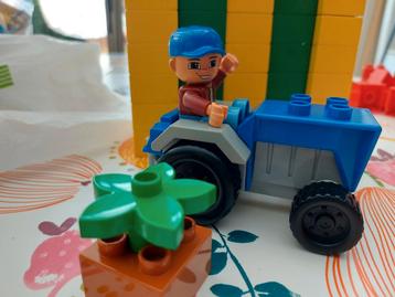 Duplo tractor met boer 4969 traktor disponible aux enchères