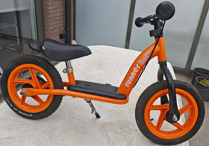 Loopfiets met rem 12 inch Oranje Runner 2000, Kinderen en Baby's, Speelgoed | Buiten | Voertuigen en Loopfietsen, Gebruikt, Loopfiets