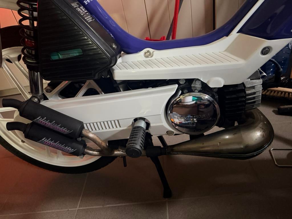 Proma attack met dubbele polymer demper, Ophalen