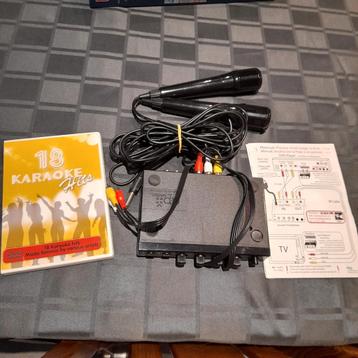 Karaokeset met 2 microfoons en karaoke dvd beschikbaar voor biedingen