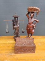 Vintage houten sculptuurwerk, Ophalen