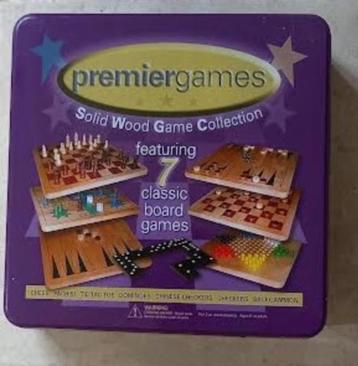 Houten spellen in blikken doos    beschikbaar voor biedingen