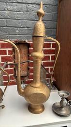Cruche en cuivre, Ophalen