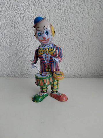 Vintage blikken clown beschikbaar voor biedingen