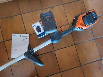 Husqvarna 215iL grastrimmer + accu als nieuw beschikbaar voor biedingen