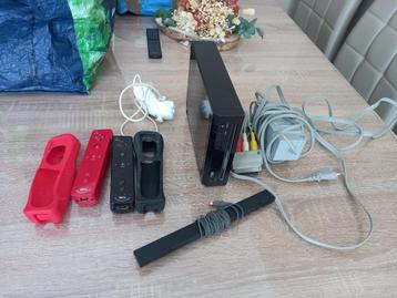 Console Nintendo Wii Noir + 2 manettes + 9 jeux ++++ impecc beschikbaar voor biedingen