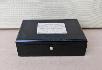 Ebben cigarillo box zilver label 'GOLF CIRCLE 1938' beschikbaar voor biedingen