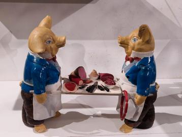 Slager winkel display , varkens als beenhouwer of kok met  beschikbaar voor biedingen