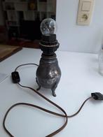 Lampe en étain, Enlèvement