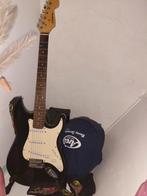 Elektrische gitaar met toebehoren, Ophalen