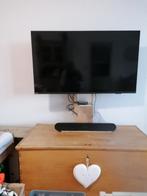 Cause départ à l'étranger. Vend télévision + barre de  son, Enlèvement