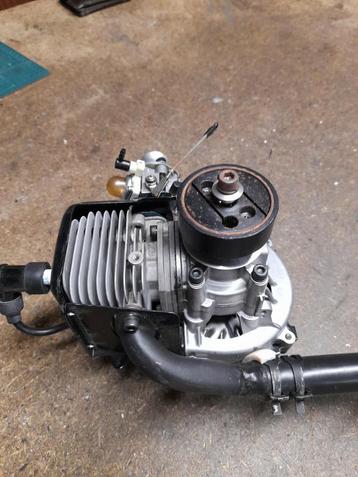a vendre. moteur vario zenoah avec silencieux zimmerman, Hobby & Loisirs créatifs, Enlèvement ou Envoi, Comme neuf, Électro