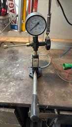 Verstuiver tester, Ophalen