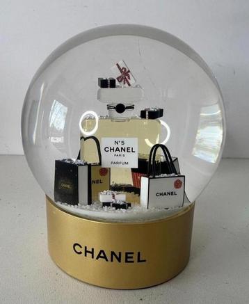 Gold Chanel snow globe