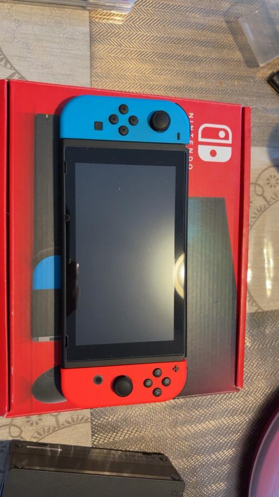 Nintendo Switch + spel, Games en Spelcomputers, Spelcomputers | Nintendo Switch, Zo goed als nieuw, Switch Original, Met games