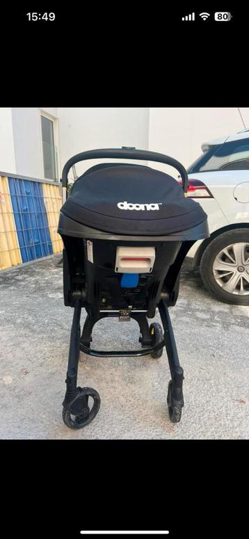 Poussette doona noire avec rehausseur est ses caches roues, Enlèvement, Comme neuf, Poussette