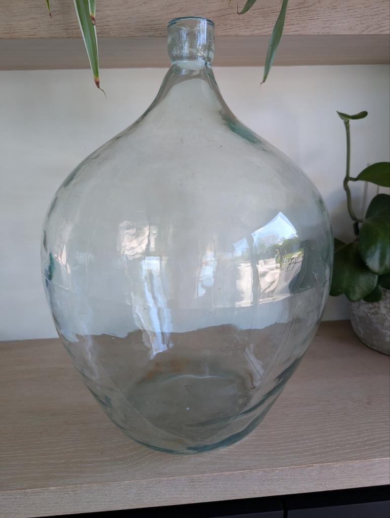 Dame Jeanne vaas/fles, Ophalen