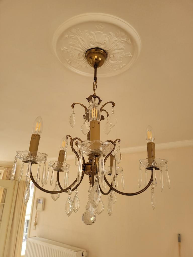 Gekroonde luster in koper, Ophalen