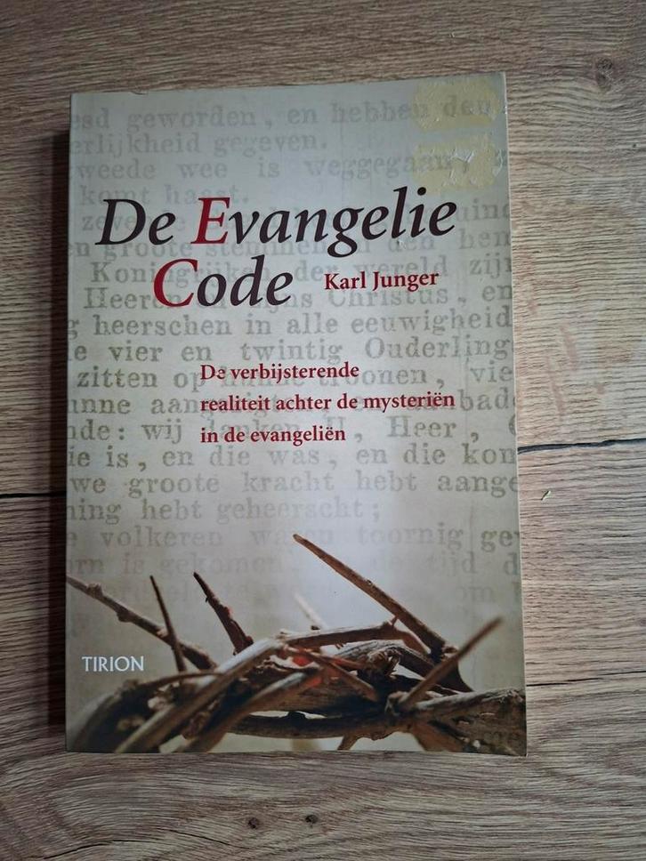 Boek : De Evangeliecode / K. Junger, Boeken, Godsdienst en Theologie, Zo goed als nieuw, Ophalen of Verzenden