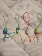 Gelukspoppetjes, Ophalen