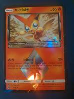 Victini Prisme, Hobby & Loisirs créatifs, Enlèvement ou Envoi, Neuf, Cartes en vrac, Foil