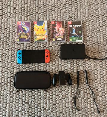 Nintendo Switch en stuur, Games en Spelcomputers, Ophalen, Zo goed als nieuw, Switch OLED, Met games