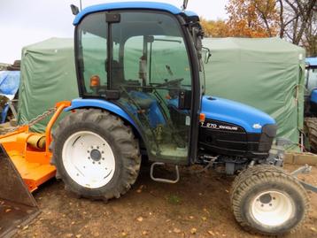 AV tracteur New Holland 4x4 disponible aux enchères