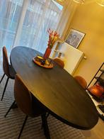 Zwarte ovalen eettafel in mangohout met stalen poten., Enlèvement, Comme neuf