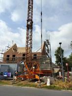 Bouwkraan Arcomet T 25 te Brecht, Ophalen, Zo goed als nieuw