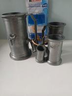 Tinnen bekers, Enlèvement