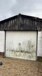 Oude garagepoort, functioneel., Enlèvement