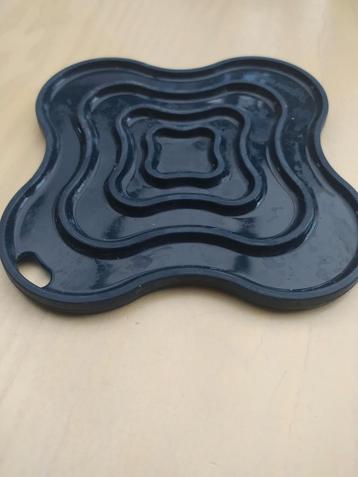 Silicone onderzetter van tupperware beschikbaar voor biedingen