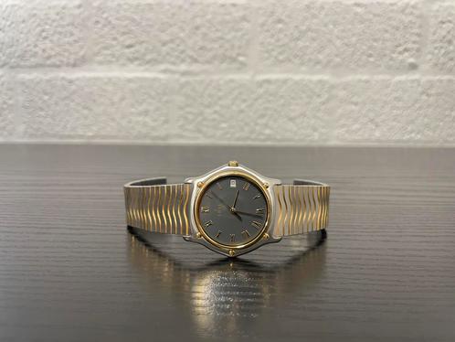 Zeer Nette Ebel Wave 18K Staal Goud 35mm Horloge, Handtassen en Accessoires, Horloges | Heren, Zo goed als nieuw, Breitling, Goud