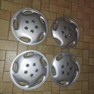 Gloednieuwe wieldeksels 14inch te koop! beschikbaar voor biedingen