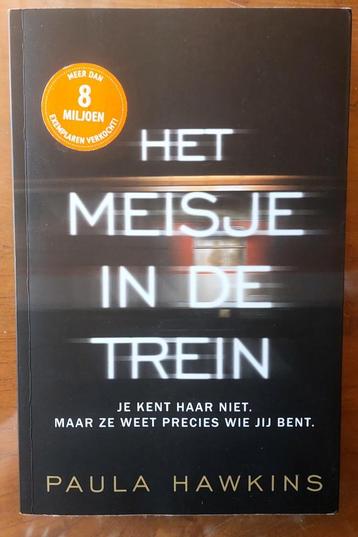 Boek - Thriller - Paula Hawkins - Het meisje in de trein beschikbaar voor biedingen