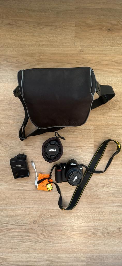 Nikon D3100-pakket + 2 lenzen + accessoires, Audio, Tv en Foto, Foto | Cameratassen, Zo goed als nieuw, Ophalen of Verzenden