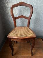 Ancienne chaise cannée, Ophalen