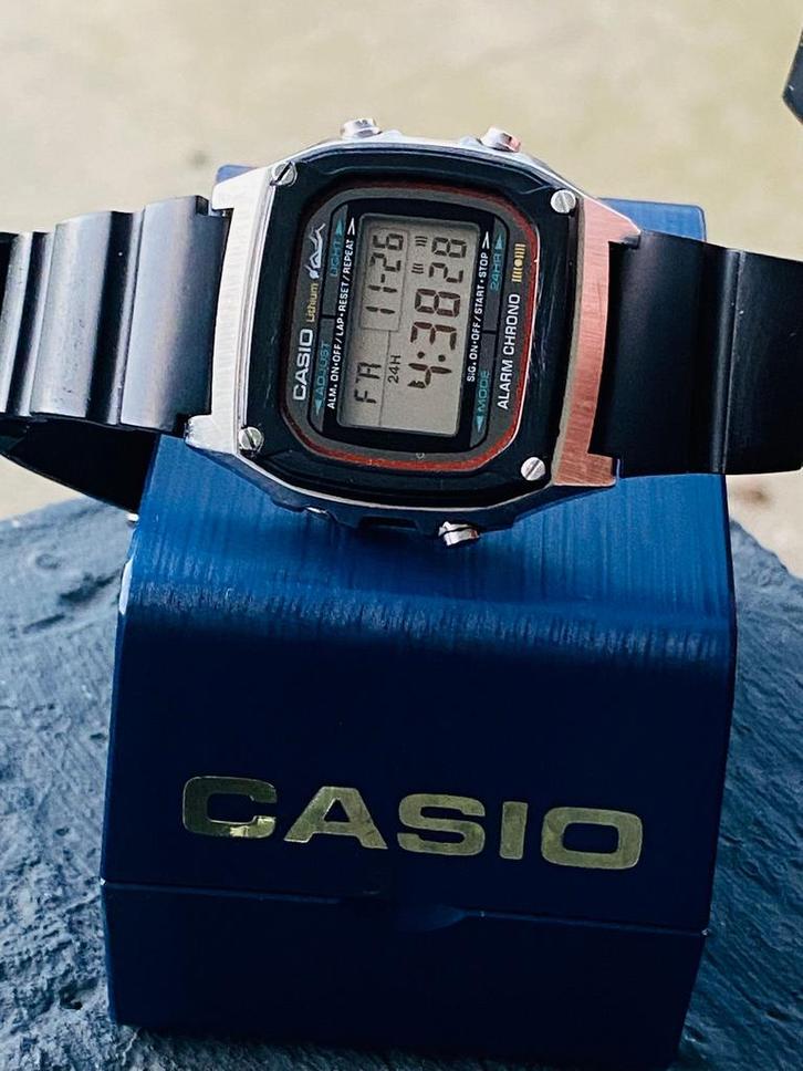 Vıntage CASIO DW -1000 - ZELDZAAM ‘81 -, Handtassen en Accessoires, Horloges | Heren, Gebruikt, Polshorloge, Casio, Staal, Leer