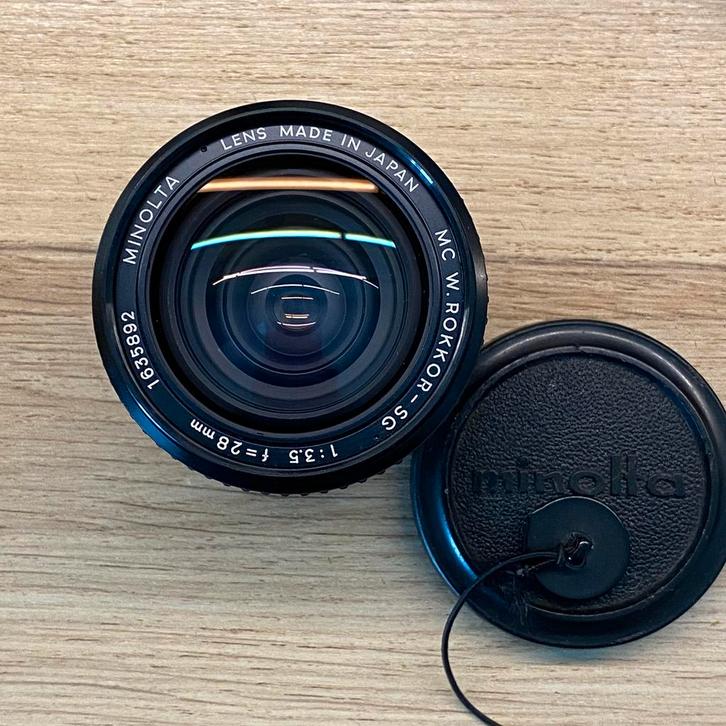 Minolta MC W.Rokkor-Sg 28mm f3.5* nieuw!, Audio, Tv en Foto, Fotocamera's Analoog, Zo goed als nieuw, Spiegelreflex, Minolta, Ophalen of Verzenden