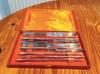 Coffret de onze couteaux inox vintage Fliba styl, Gebruikt, Ophalen of Verzenden, Bestekset, Inox of Chroom