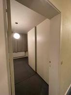 Witte kleerkast met schuifdeuren, Ophalen