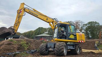 Komatsu PW 150 es Mobiele graafmachine Bandenkraan kraan beschikbaar voor biedingen