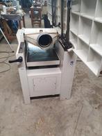 Een scam van 410 schaafmachine, Ophalen