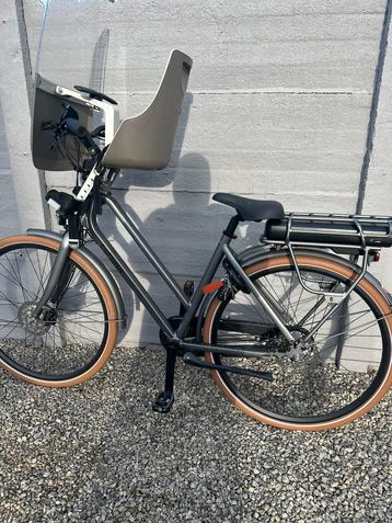 Elektrische fiets Cortina met bijpassende kinderstoel beschikbaar voor biedingen
