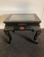 Chinese salontafel, Ophalen